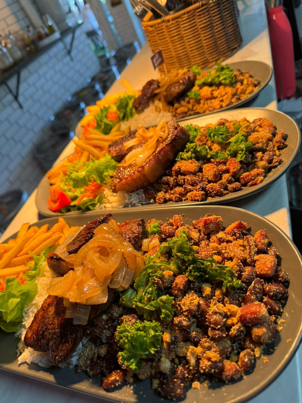 Feijão Tropeiro with pork belly, rice and salad